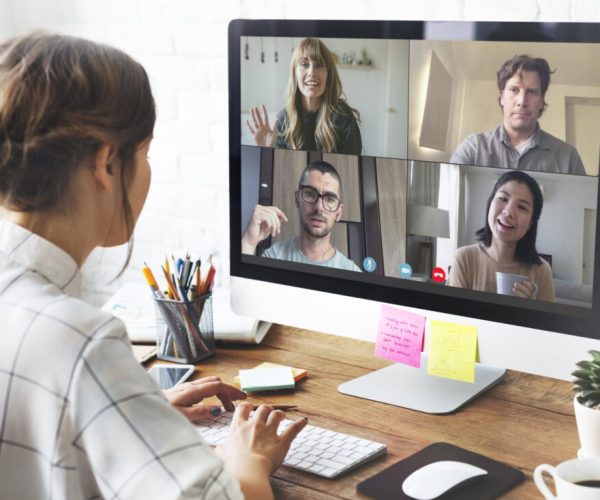 Woman in a video conference call in her home office during the coronavirus pandemic